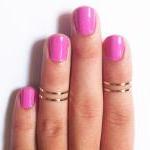 4 Above The Knuckle Rings ..