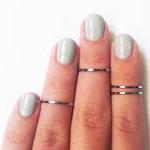 4 Above The Knuckle Rings ..